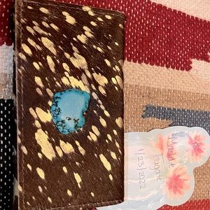 Acid washed brown cowhide wristlet with turquoise nugget